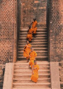 Buddhist kids wearing orange robes